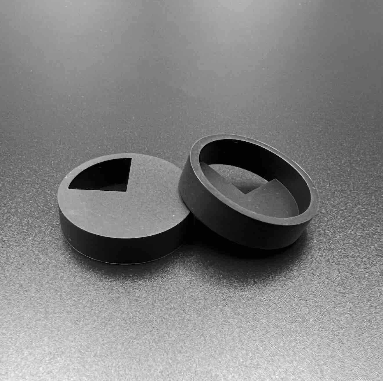 Custom silicone plug with cut-out for hanging solution made by maskingsupply.com